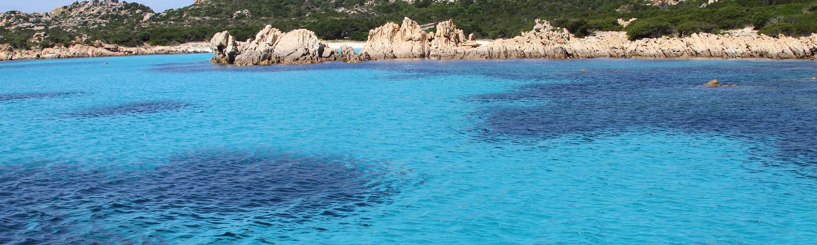 Budelli’s turquoise water with granite rocks
